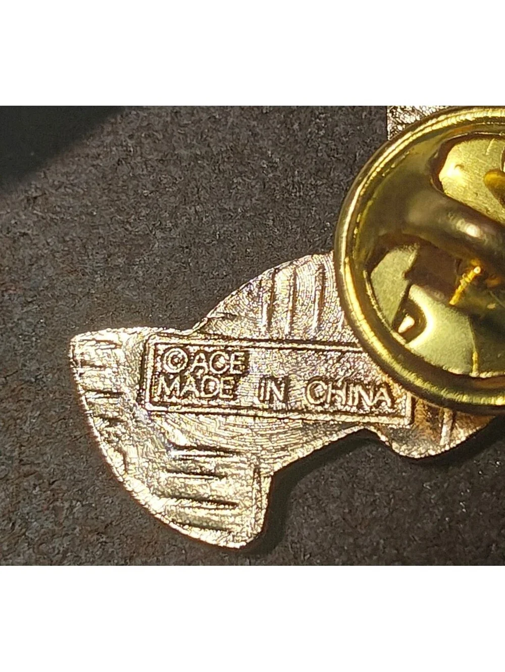 1980s Alaskan Polar Bear Guardian Angel Gold Tone Enamel Pin.